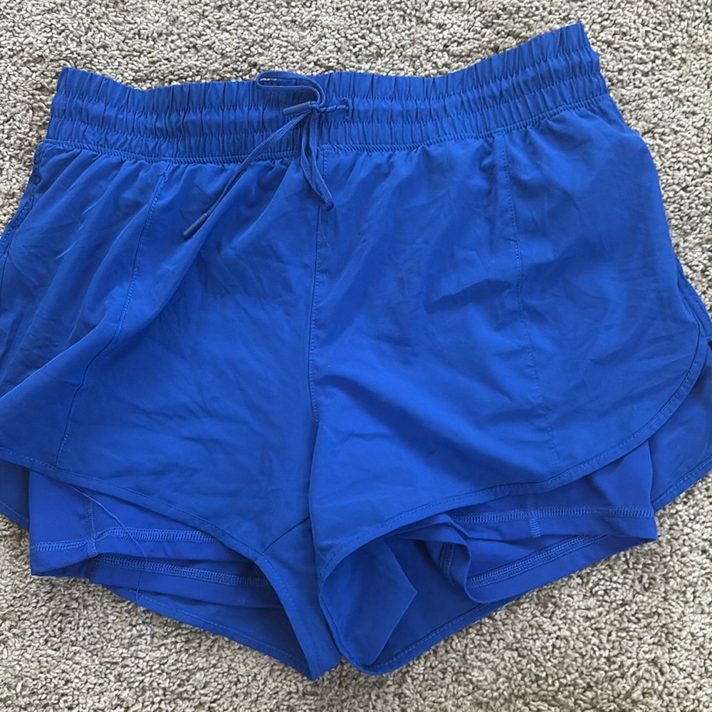 Athletic shorts with built in compressions.